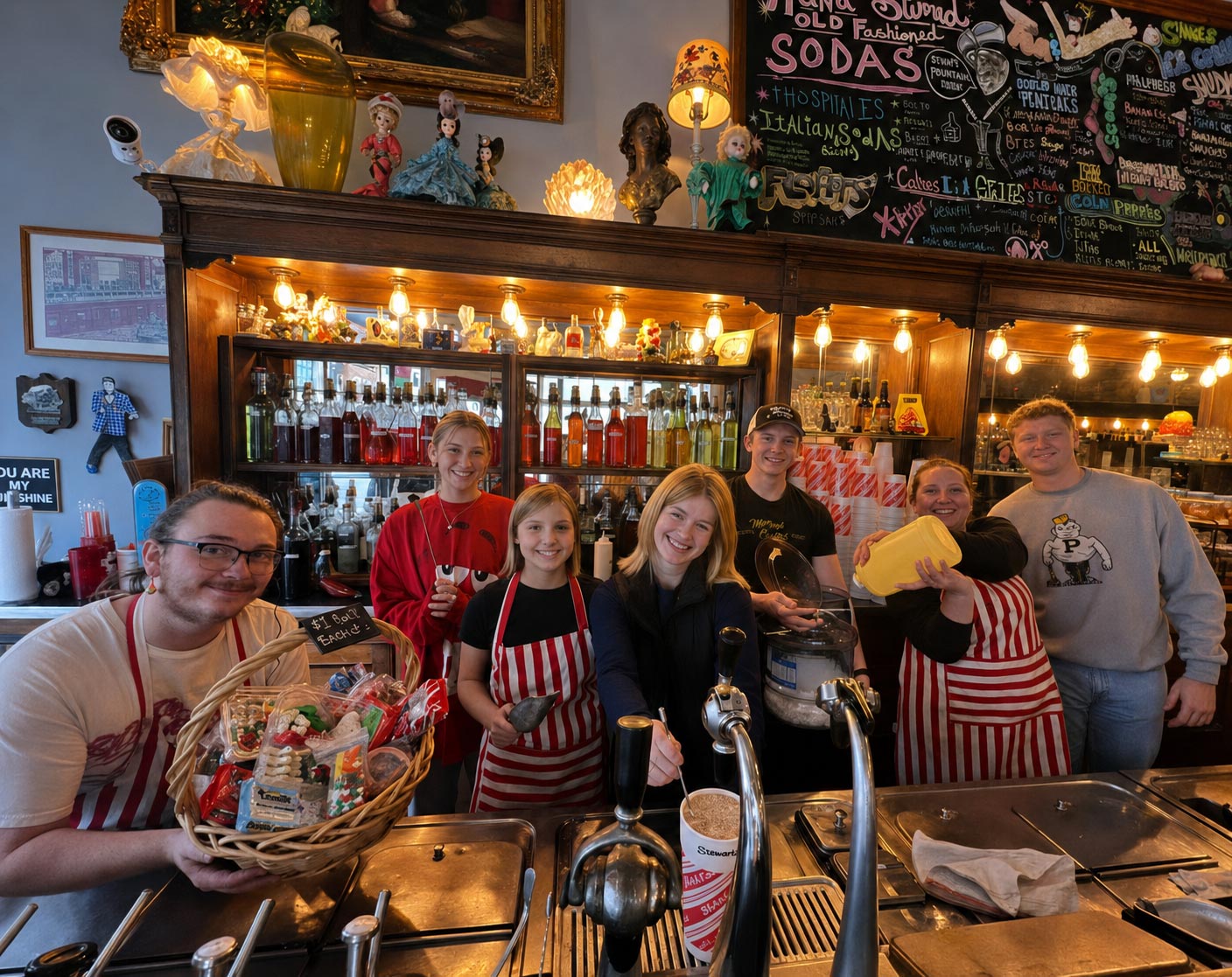 The McCord Candies team behind the vintage soda fountain